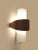 This beautiful philips nx 40 wall lamp, designed by louis kalff, is a real eye-catcher on the wall. The opal glass shade...