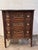 A wonderfully 19th century French carved chest of drawers. This antique French piece features three large drawers and...