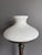 Beautiful vintage brass lamp with milk glass shade. Made in the Mid 20th Century