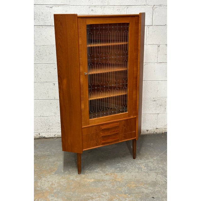 For some reason corner cabinets are not as common today, which is an absolute shame considering how incredible Danish ones...