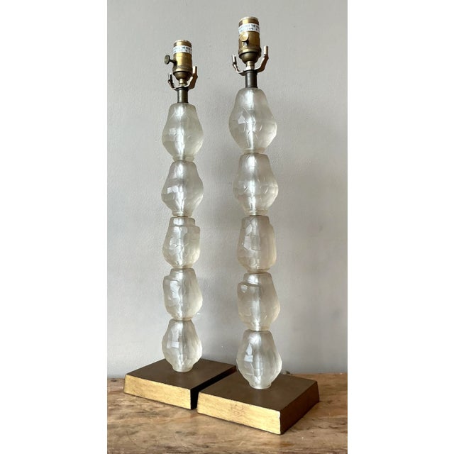 Introducing a stunning pair of vintage Hollywood Regency lamps, designed to bring a touch of glamour and sophisticated...