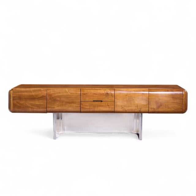 M.F. Harty for Stow Davis Tomorrow Mid Century Walnut and Chrome Credenza This credenza measures: 95.75 wide x 22 deep x...