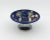 A circular Moorcroft tazza dish on an outswept Tudric pewter pedestal base, made in England for Liberty & Co. of London...