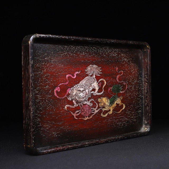 A beautifully crafted Chinese rectangular tray or display stand, likely made of rosewood (Hongmu). The tray features...