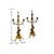 This pair brass candelabra features a charming cherub design, perfect for adding a touch of angelic detail to your home...
