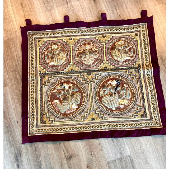 An intricately embellished vintage Burmese Kalaga-style tapestry featuring five circular medallions with elaborately...