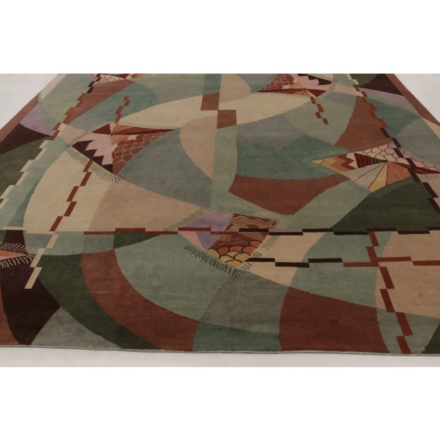Hand-knotted in wool, this 11x15 contemporary oversized rug joins Rug & Kilim’s Art Deco collection, featuring a graphic...