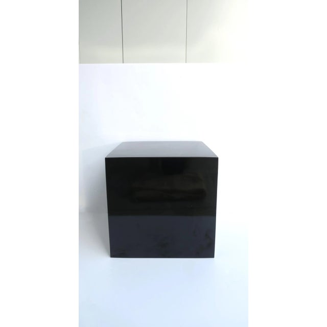 A black gloss laminate veneered pedestal or cube end table, '70s Modern/Postmodern period, circa late-20th century, 1970s...