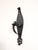 Spanish brutalist wrought iron candle wall sconce. This vintage iron wall lighting piece is hand forged with a hammered...