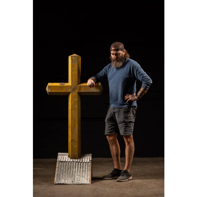 Undated and unmarked farmhouse-style painted cross. This rustic piece is mounted on a faux roof peak with corrugated tin...