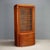 Art Nouveau mahogany display cabinet. Central glass door with three height-adjustable shelves. Half-moon base with three...