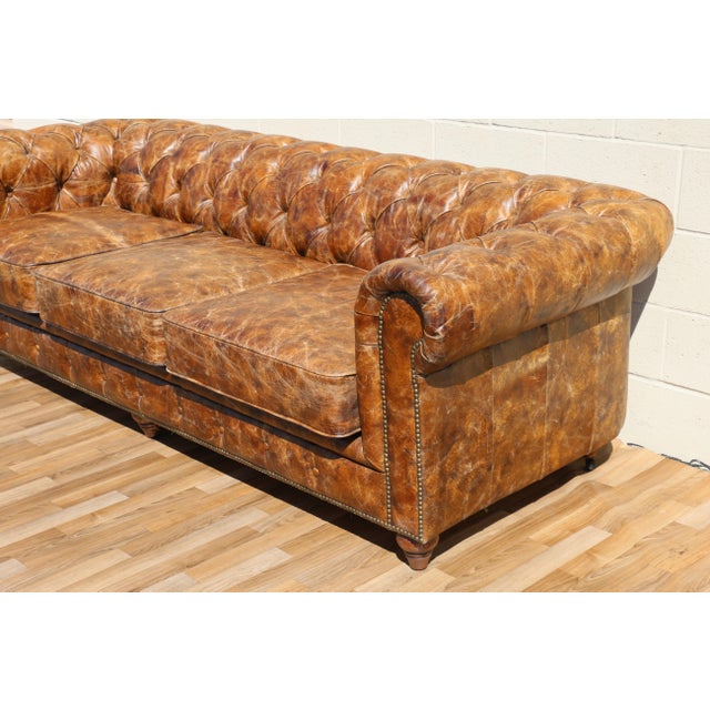 Industrial Industrial Distressed Brown Leather Chesterfield Sofa – Three Seat Tufted Sofa With Nailhead Trim & Casters For Sale - Image 3 of 18