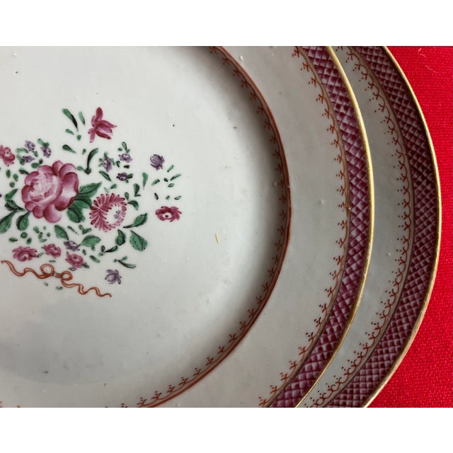 Set 10 antique 18th century Chinese export porcelain plates in famille rose palette decorated with bouquets of flowers...