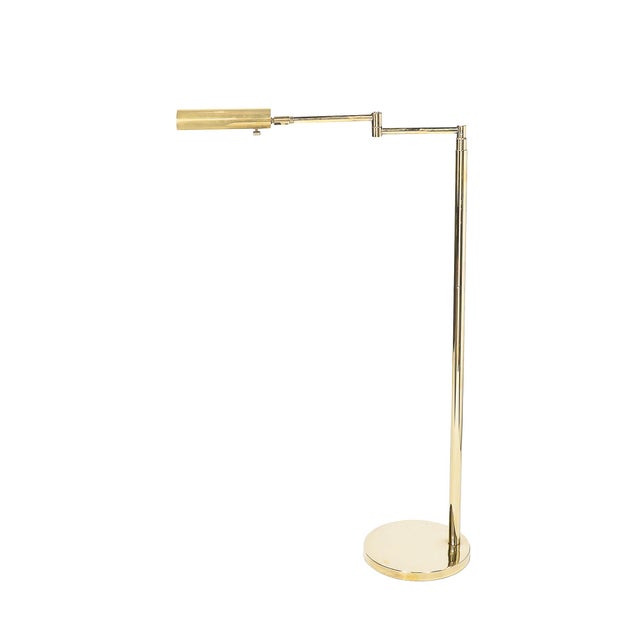 This Mid-Century Modernist floor lamp is a striking representation of American design from the 1970s. Featuring an elegant...