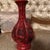 Beautiful 12-inch Chinese-style decorative vase featuring an intricate red carved design with traditional floral and...