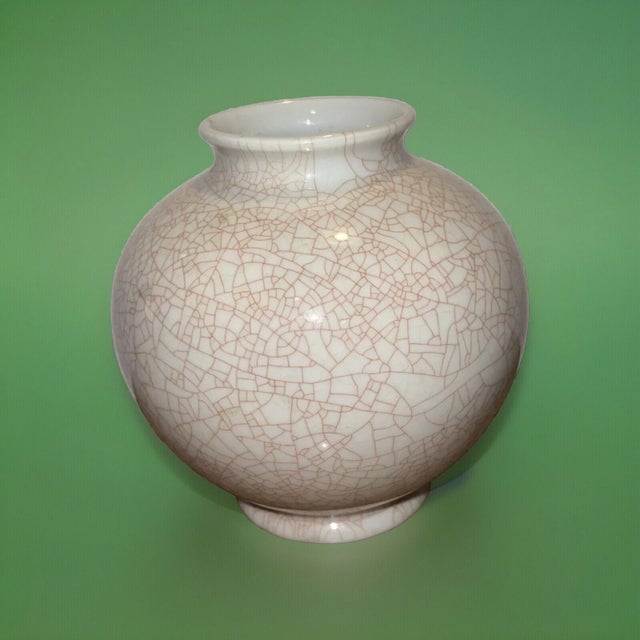 Designed circa 1930 by Marguerite Friedlaender (later Wildenhain), this marked porcelain vase was created during her...