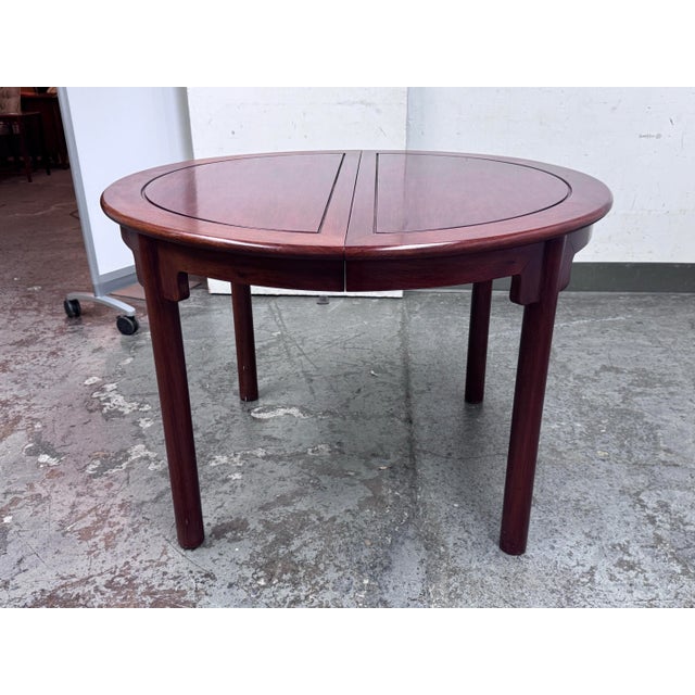 Design Plus Gallery presents an Extension Dining Table of Solid Rosewood. The small, round bistro table offers Ming design...
