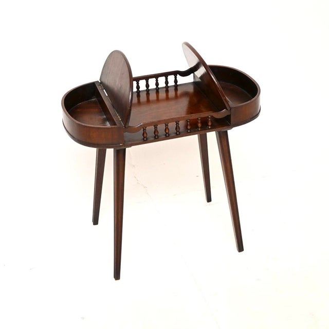 A smart and beautifully made antique walnut side / drinks table. This was made in England, it dates from around the...
