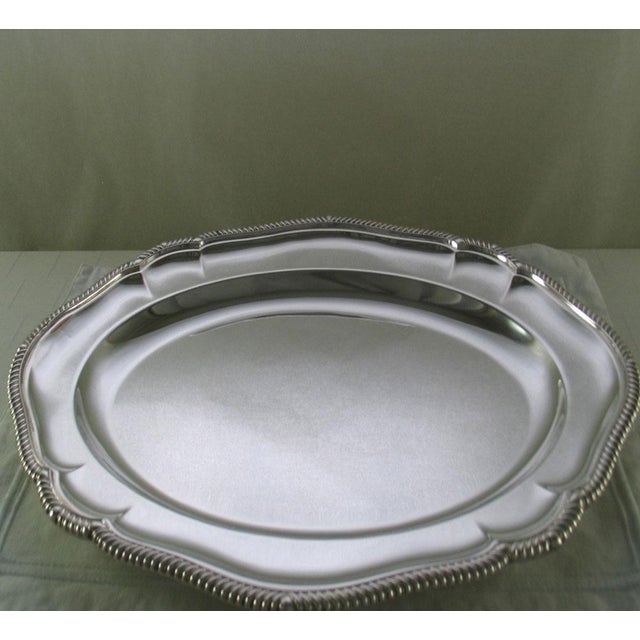 Reference # D 1620-23. Photo 203 Silver Oval Shaped Platter 23 in.with Running Gadroon Applied Border. Pattern : Shaped...