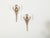 A pair of English vintage silver plated wall sconces from the mid 20th century, with two lights and foliage motifs....