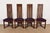 An exceptional set of four Arts & Crafts style high back dining chairs In the manner of Frank Lloyd Wright or Charles...