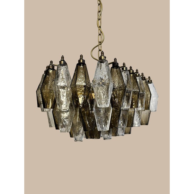 DUTIES FREE There are chandeliers that light a room. And then there are pieces that turn it into a statement. This...