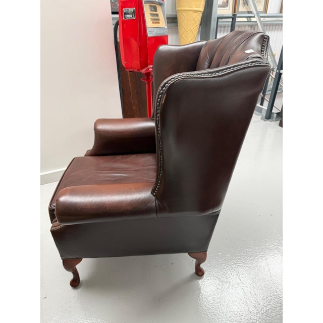 Brown Leather Wing Chair, 1980s, in Very Good conditions. Designed 1980 to 1989