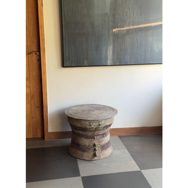 A striking fusion of ancient tradition and sculptural design, this cast bronze rain drum is handcrafted by master artisans...