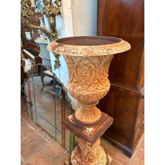 The Antique English Cast Iron Garden Urn on Pedestal is a historic and elegant addition to any garden. Made of durable...