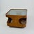 Sculptural coffee table produced in Italy during the 1970s. The piece features a curved wood structure with large circular...