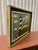Artwork strongly resembles the art style of American artist Warren Kimble. The piece is likely a hand-painted featuring a...