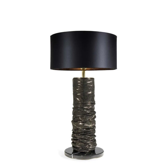 Table lamp Base: Polished Nero Marquina marble Body: Pixel Gold leather Lamp shade: Opulent satin black Details: Polished...