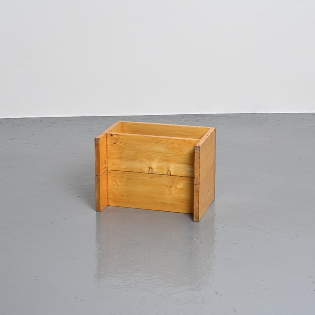 Small inverted U-shaped side table in solid pine with one shelf Provenance: Les Arcs 1800, circa 1975