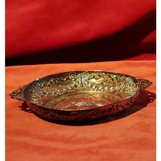 Sponsor mark, import mark, an unidentified mark Italy, probably 1890 The decoration is the family heraldry of the...