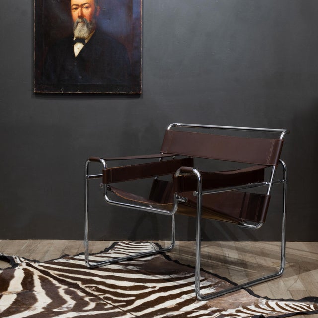 ABOUT This vintage mid-century modern brown B3 Wassily arm chair designed by Marcel Breuer was manufactured by Knoll...