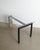 A rare and sculptural swedish contemporary "concrete" desk table in black lacquered metal, a decorative solid concrete...