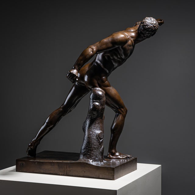 Bronze figure of the Borghese Gladiator after the antique original. Stamped on the base “F. Barbedienne” and marked...