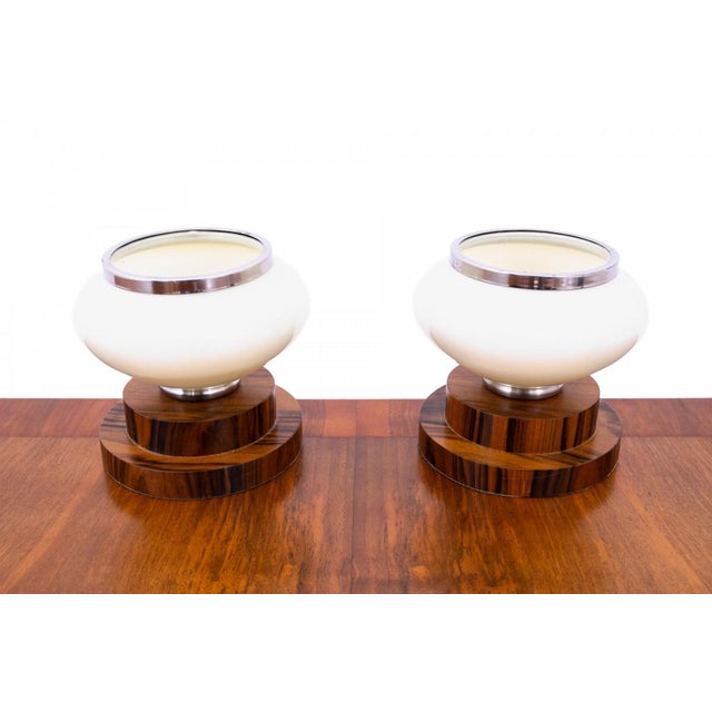 Pair of bedroom lamps, Poland, mid-20th century. Very good condition, professionally restored. Wood: walnut Dimensions:...