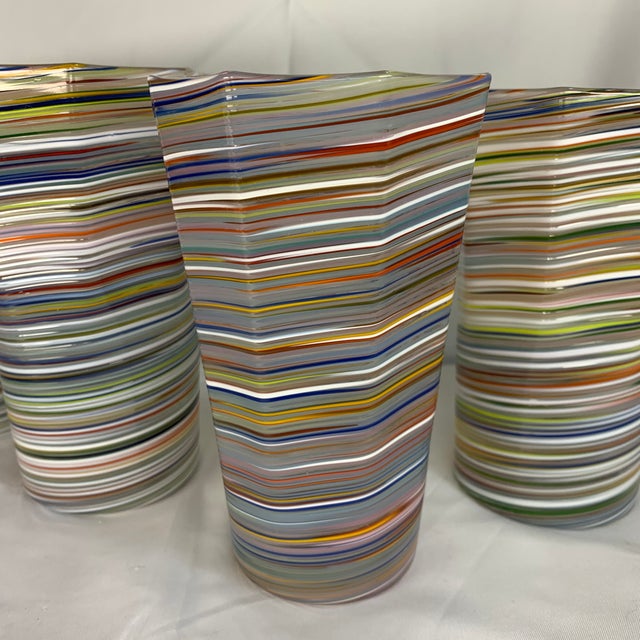 Offered here are hand-blown octagonal striped glass tumblers, likely by Craft Advisory. Eggshell thin, studio art glass...