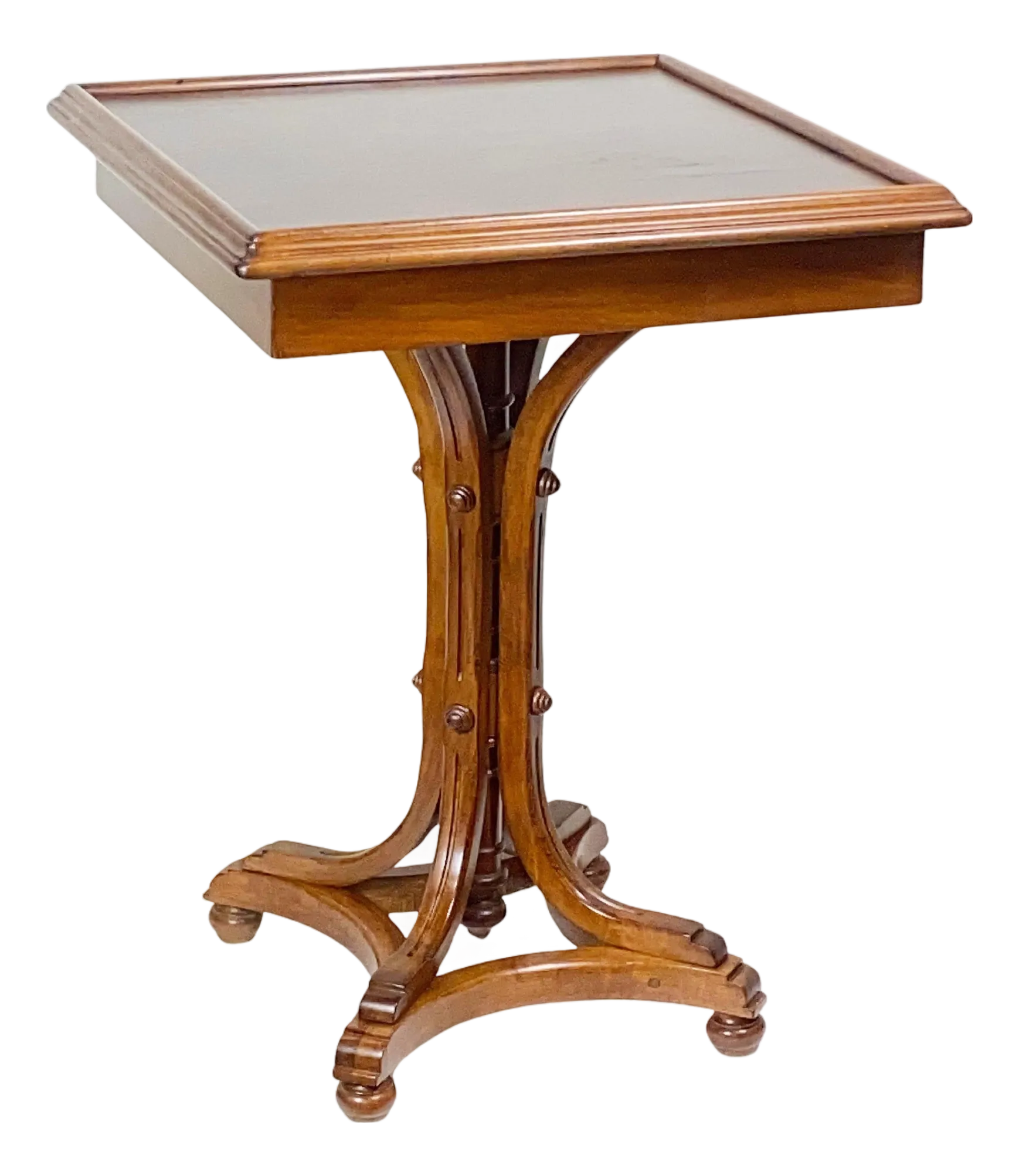 Wooden table with a rectangular top and turned pedestal base on white background.
