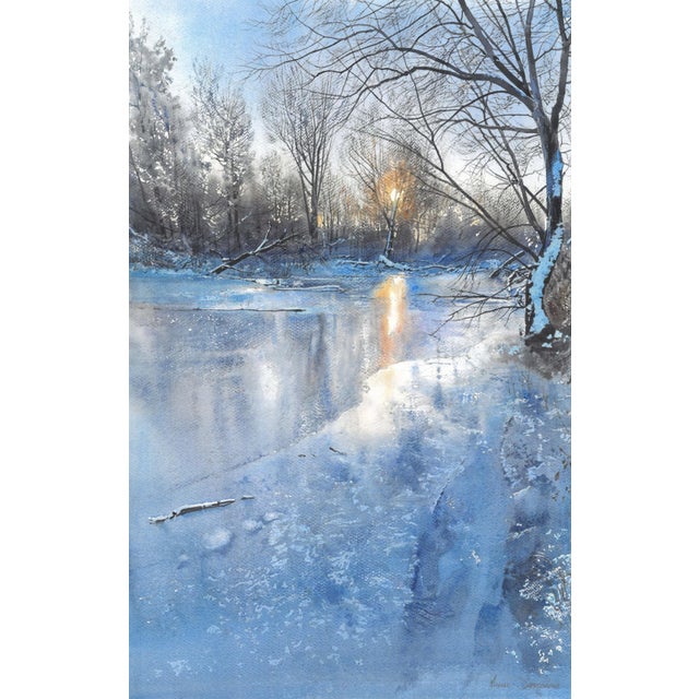 This stunning watercolor artwork vividly captures a serene winter landscape, where the clarity of the frozen river...