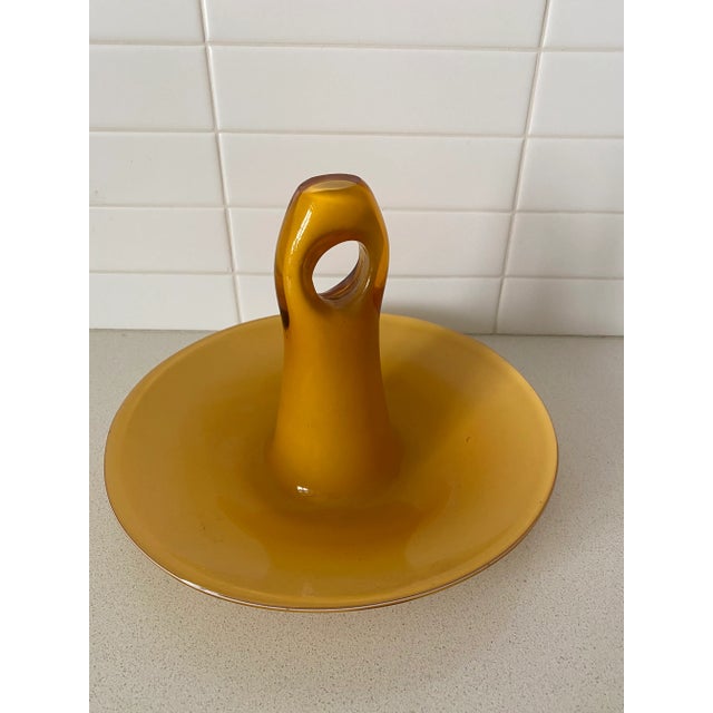 Unusual hand blown cased glass candy dish. What is striking about this piece is the handwork necessary to create the...