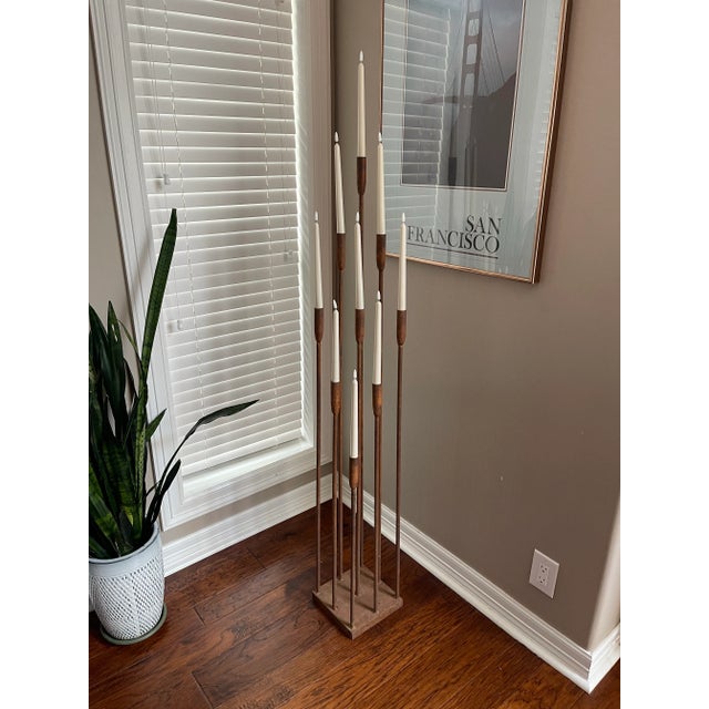 Beautiful, hard-to-find brutalist floor candelabra after Harry Bertoia. Features 9 cascading candle holders at varying...