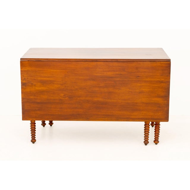 American Maple Drop Leaf Dining Table, atop bobbin turned legs. Closed: 29.25" H x 47.5" W x 25.75" D; open: 29" H x...