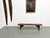 Maison Lecan presents: The essence of rustic furniture: simple, useful, and beautiful. This long 1950s pine farmhouse...