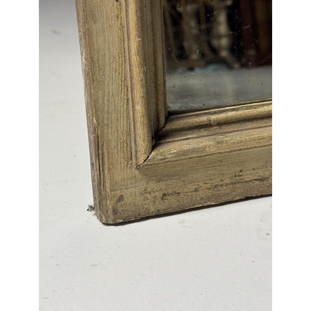 Antique French mirror, early 20th century. with bumpy / wavy glass creating a fun effect when looked into. Dimensions:...