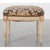 Dimensions: 19”H x 24”W x 24”D A beautifully proportioned, 19th century Louis XVI-style French footstool. The pillowy...