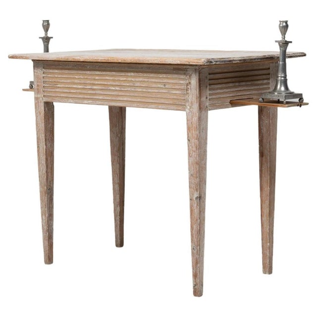 Gustavian game table from Sweden made during the late 18th century, around 1790. The table is painted pine with the...