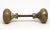 Antique solid cast brass petite door knobs. The manufacturer and date of creation is unknown. Good condition with surface...