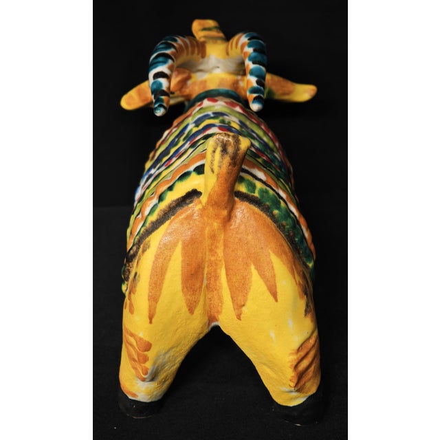 A lively and scenic goat, crafted in Vietri ceramic and signed "Caruso" on the bottom. The work is characterized by hand-...